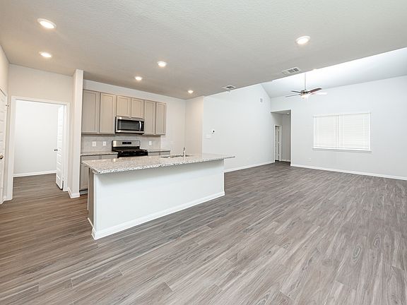 Dining Area to Kitchen and Family Room