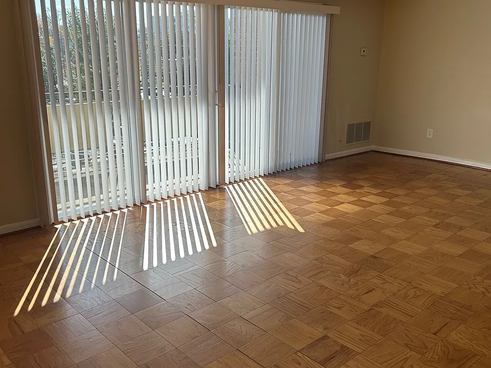 4K Living Room / Dining Room looking at sliding doors to balcony.