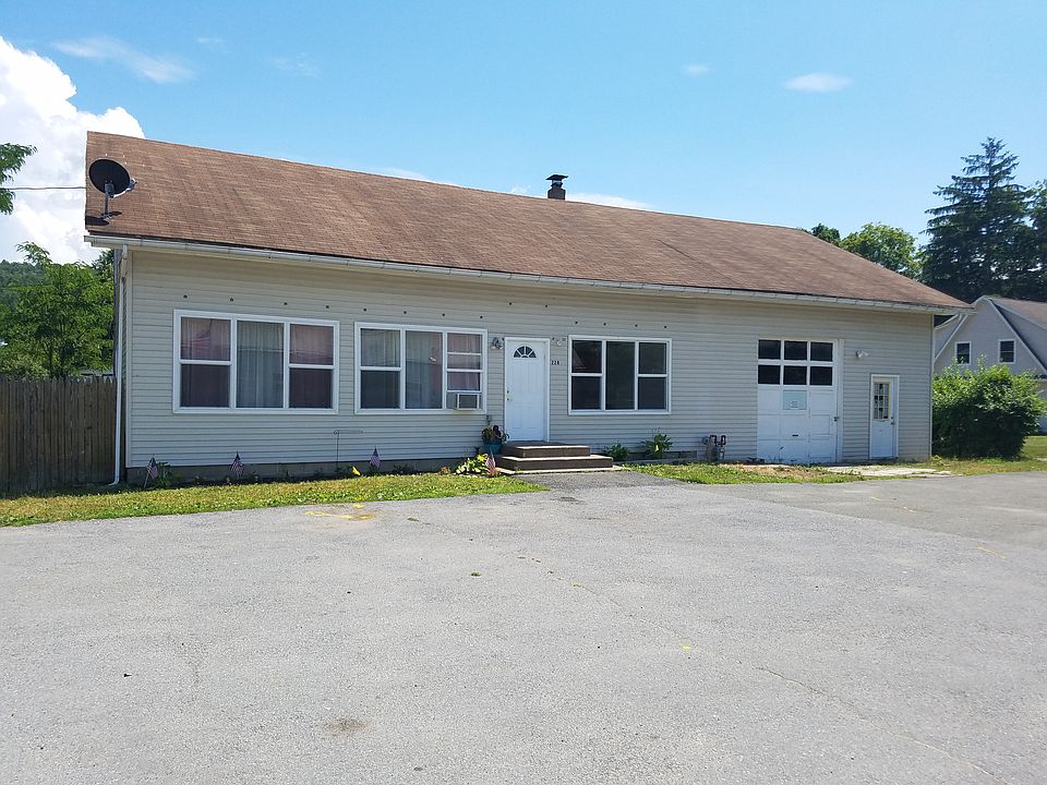 Front of apartment. 3 units in building. This one is on the left.
