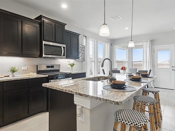 Kitchen - All Home and community information, including pricing, included features, terms, availability and amenities, are subject to change at any time without notice or obligation. All Drawings, pictures, photographs, video, square footages, floor plans, elevations, features, colors and sizes are approximate for illustration purposes only and will vary from the homes as built.
