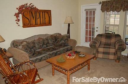 Living room, door onto patio.