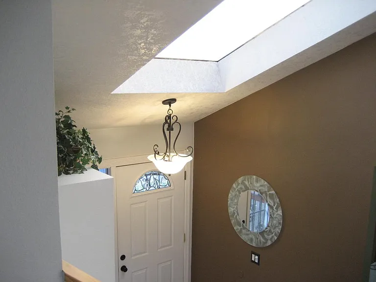 Skylighted entryway has shade