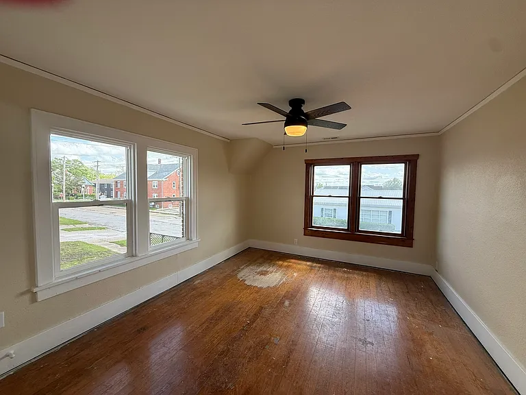 BR2 - upstairs. Hardwood floors are being refinished.
