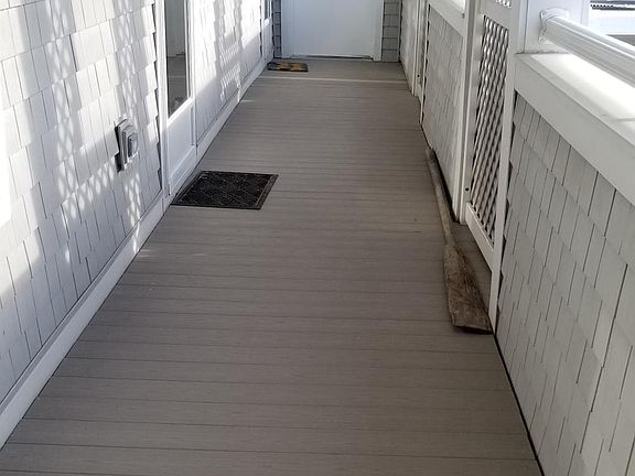 Entrance walkway to unit from behind the main building.