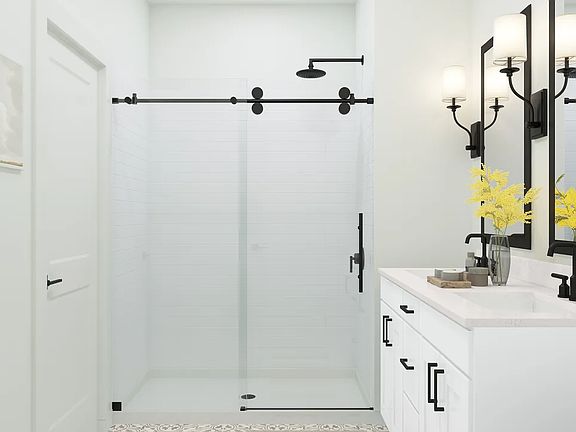 Primary bath with glass shower enclosure
