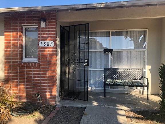 Entrance has a screen door for extra security and fresh air when you want it. Unit is half of a duplex.