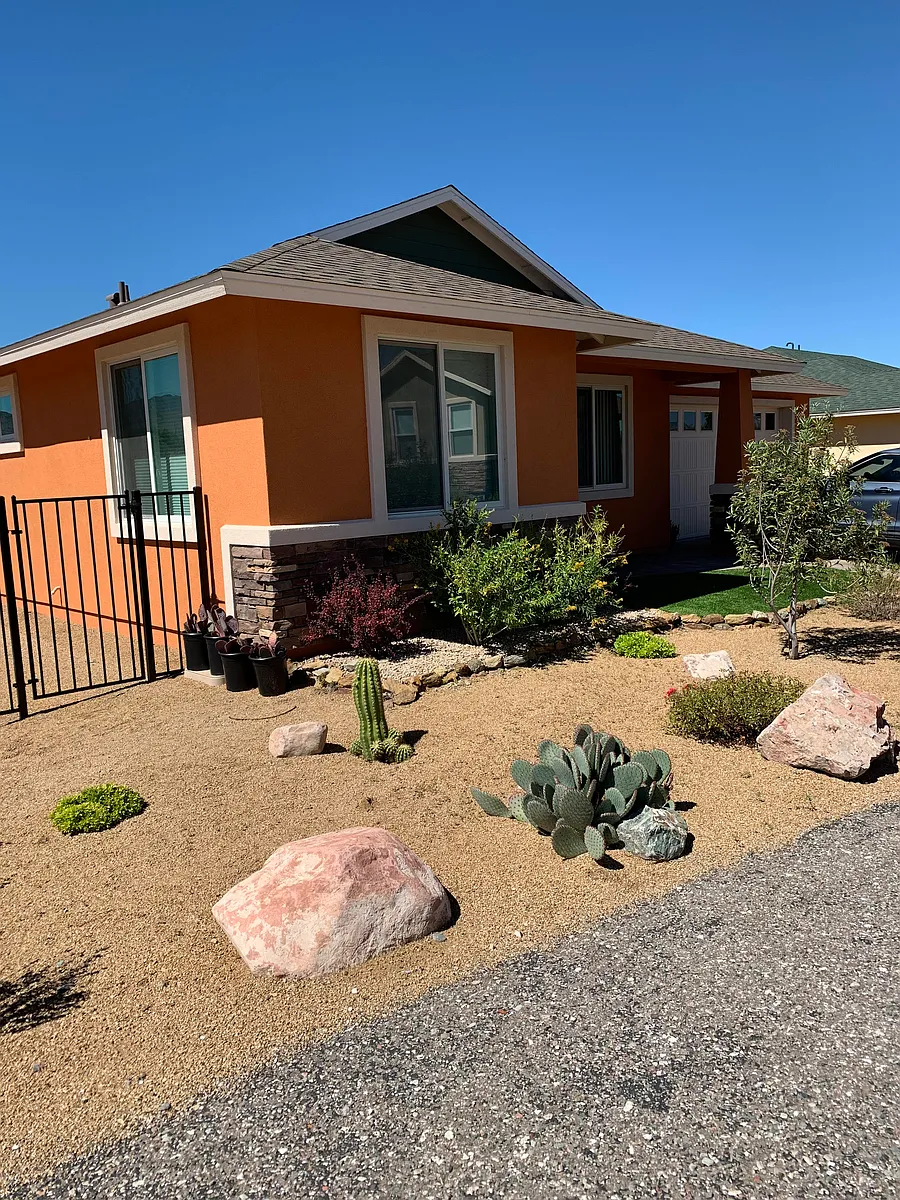 Welcome to 445 Kindra Heights Road. The front yard of the home, which is located on the corner of a cul-de-sac and a dead end road. The street gets little traffic. - 445 Kindra Heights Rd