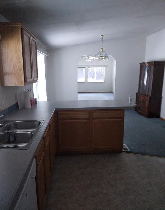 Looking from kitchen towards dining and family rooms. China cabinet is not part of the home, but is available.
