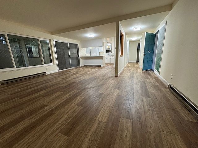 Spacious living, dining, and kitchen. Large open area for different furniture configurations