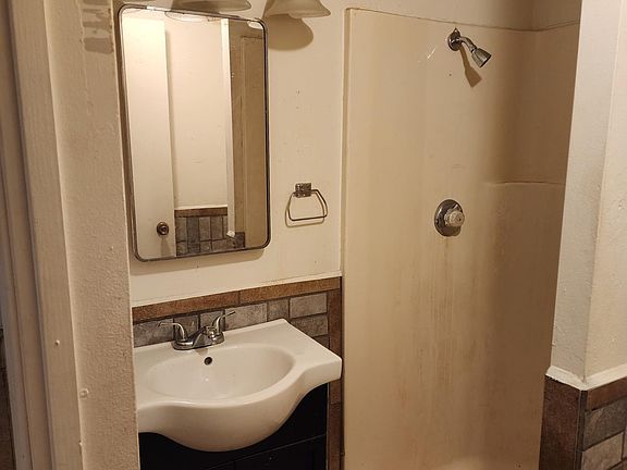 Bathroom vanity and shower