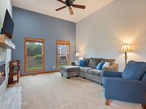 FAMILY ROOM WITH COZY FIREPLACE