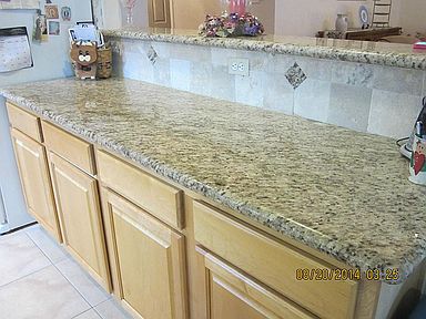 Owners updated with pretty granite, and tile backsplash, with granite decorator touches. Really Nice