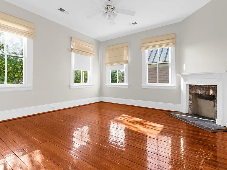 First Bedroom to the Left at the Top of the Stairs with Fireplace