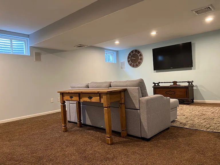 Super large 700 square foot living room with 65 inch flat screen TV with full Wi-Fi Service.