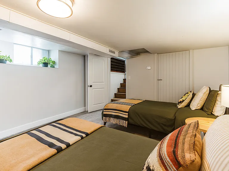 Fresh, functional, and full of charm_this twin room is a peaceful haven after a day of adventure.