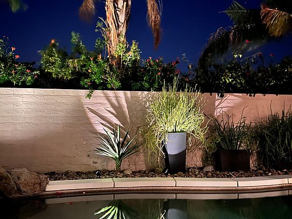 relax outside in the evening by pool