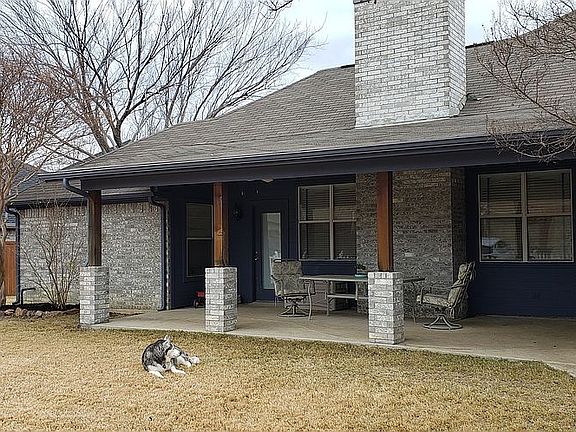 Covered back porch with fans