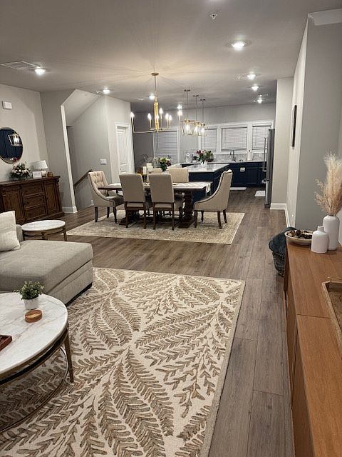 Living room angle facing dining area and kitchen