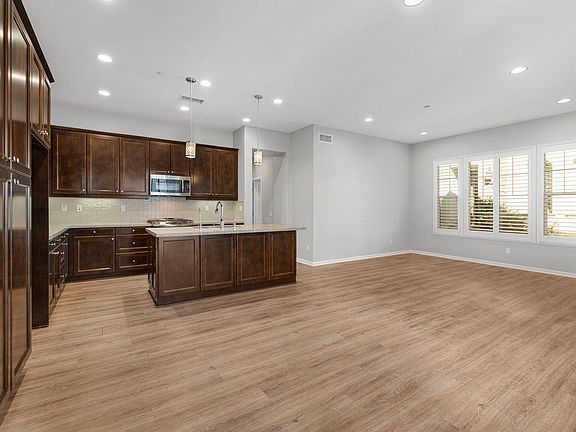 Open Concept Living with Kitchen open to living room! Plantation Shutters & Lots of Natural Light!