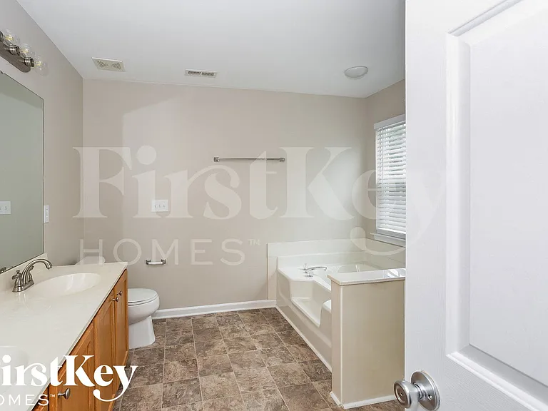10912 Harringham Ln — Photo 11