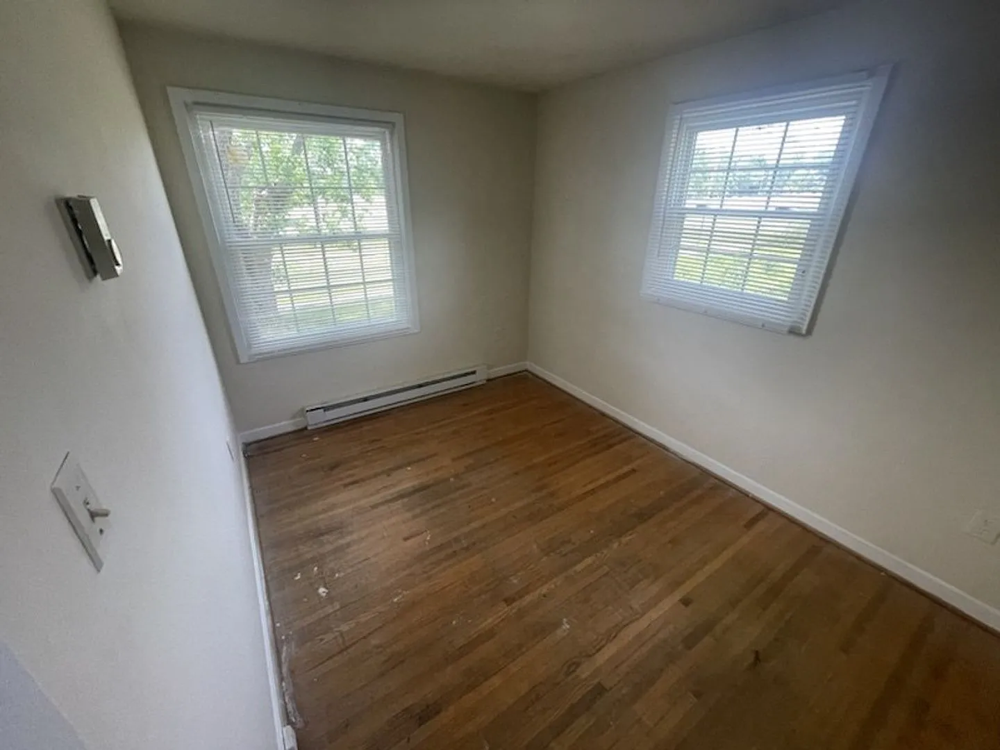 Charming 3BR Home with Hardwood Floors & Spacious Yard — Photo 2