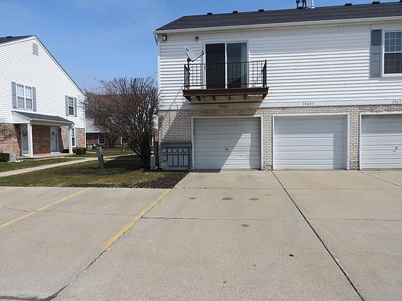 Attached 1 Car Garage and Balcony