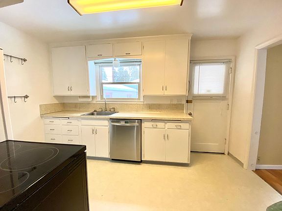 Kitchen. Door to access backyard.