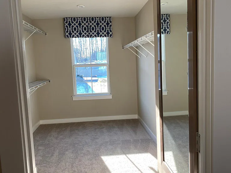 Enormous Walk-in Closet in the Primary Bedroom Bathroom SUITE