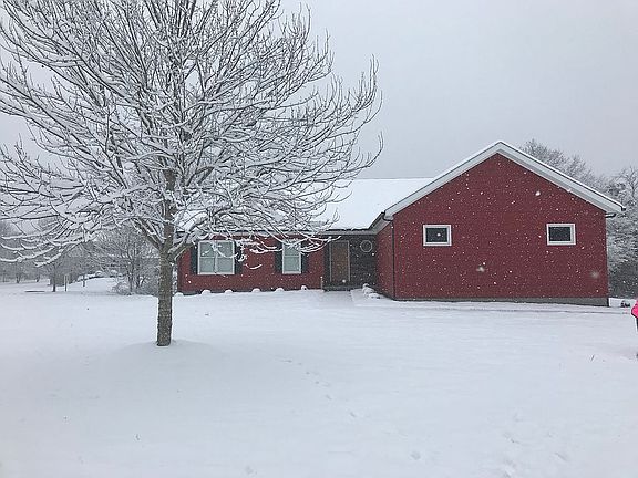 Front of home in snow