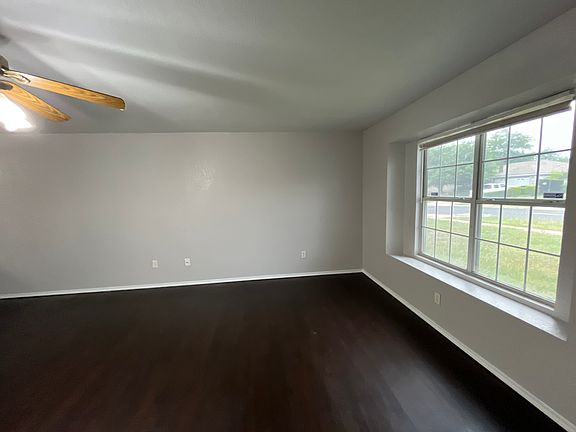 Living room with large viewing window.