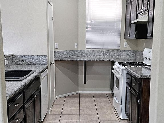 Kitchen with granite countertops