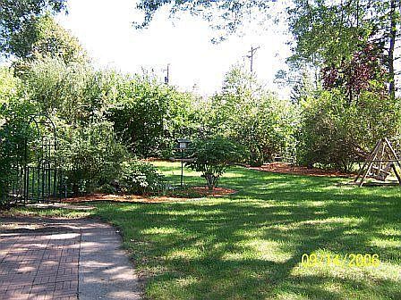 Large yard with pond