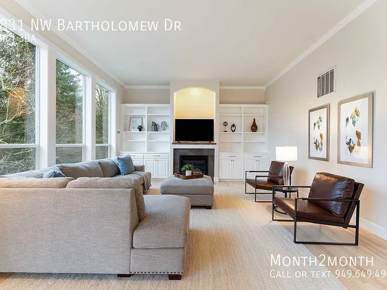9831 NW Bartholomew Dr — Photo 2