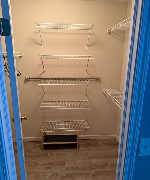 Walk-in master bedroom closet.