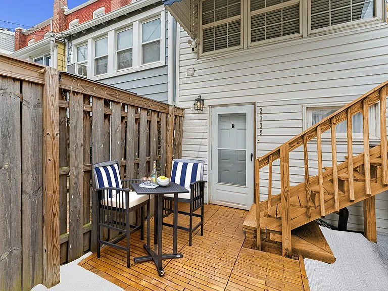 Front patio in front of lower level unit
