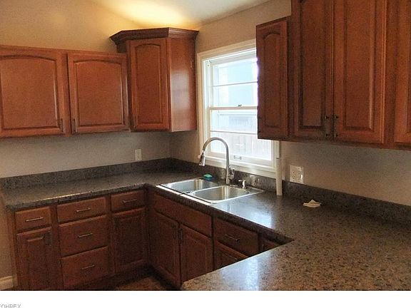 All New Cabinetry With Accent Lighting, Counter, Flooring, Sink And Recessed Lighting.