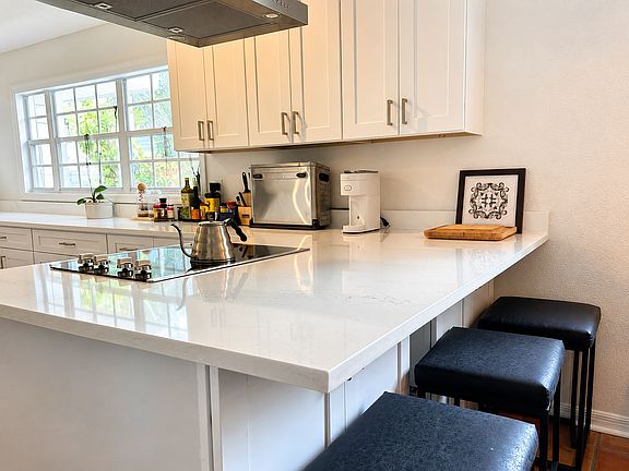 Peninsula with bar stools