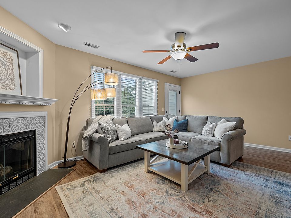 Bright and inviting living room with fireplace and modern finishes