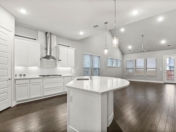 Kitchen in the Waldorf II home plan by Trophy Signature Homes - REPRESENTATIVE PHOTO