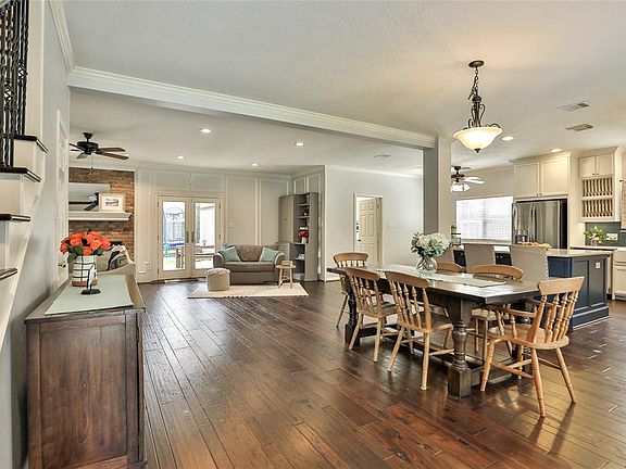 Wow, look at this open concept first floor! Current owners opened up the dining room and kitchen to the living area. Perfect for entertaining!