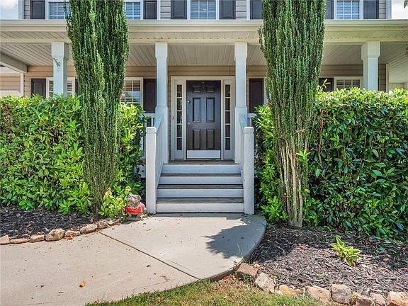 entry and wraparound porch