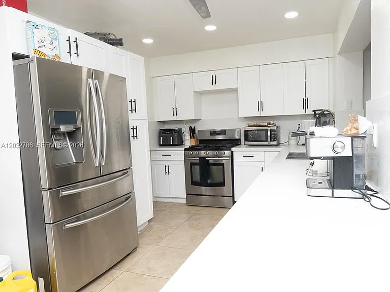 5941 NW 14th Ct — Photo 7