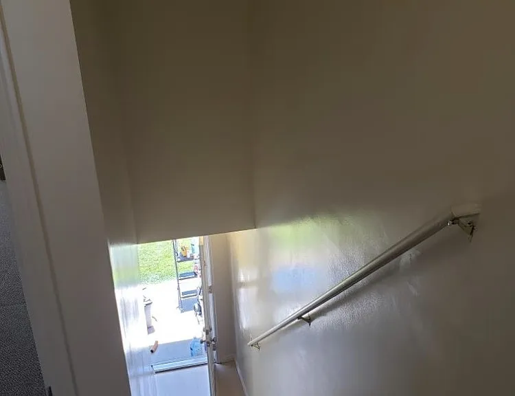 Staircase leading to bedrooms.
