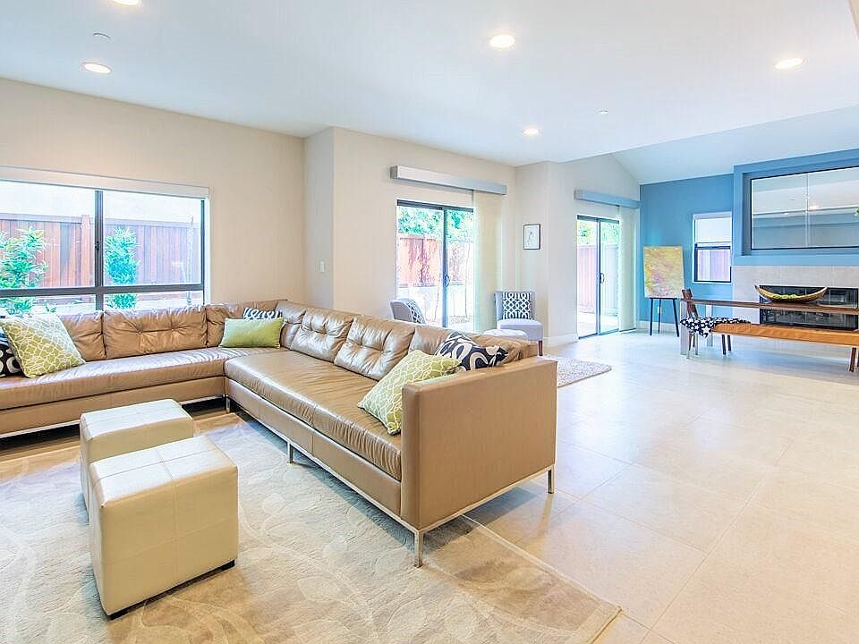 Spacious living room w/great flow to wrap-around yard. (now neutral color)