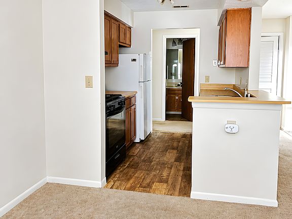 Picture of kitchen taken from dining space