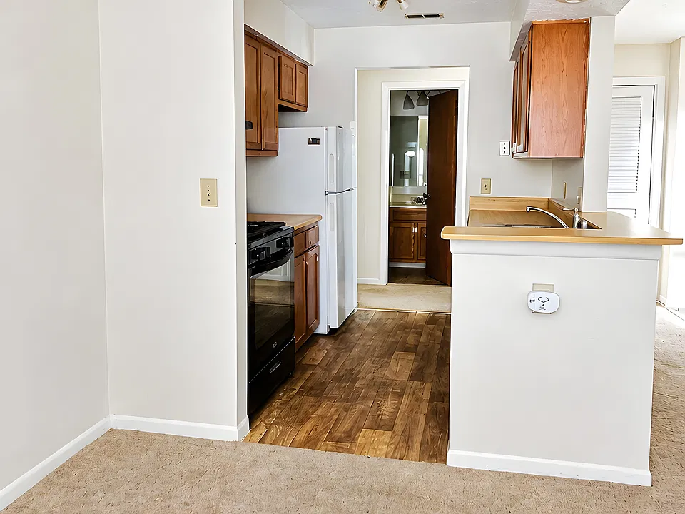 Picture of kitchen taken from dining space