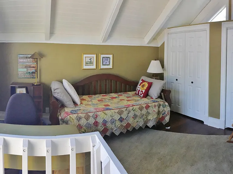 Loft with daybed and desk.