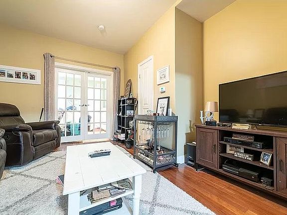 Living Room looking toward bedroom. This room as been repainted light grey.