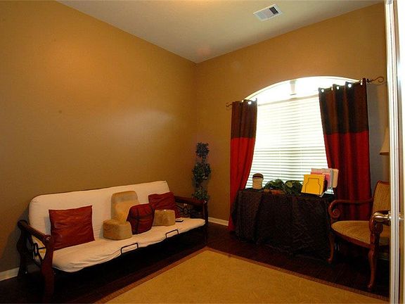 Study/Library with French Doors and Neutral Paint