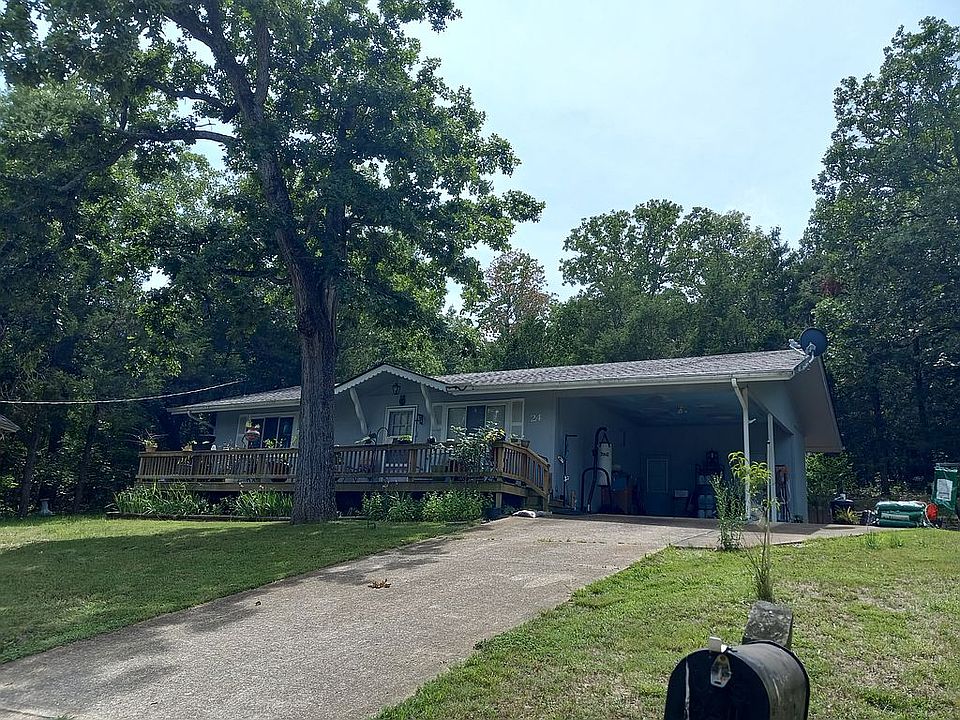 Quiet secluded home nestled in the woods. A rarity for Cherokee Village.